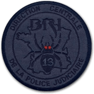 Ecusson brodé de la BRI 13 de la direction centrale de la police judiciaire. Il est réalisé en basse visibilité, de couleur noire gris et représente la carte de France avec au centre une araignée.