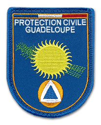 Ecusson principalement bleu de la protection civile de Guadeloupe